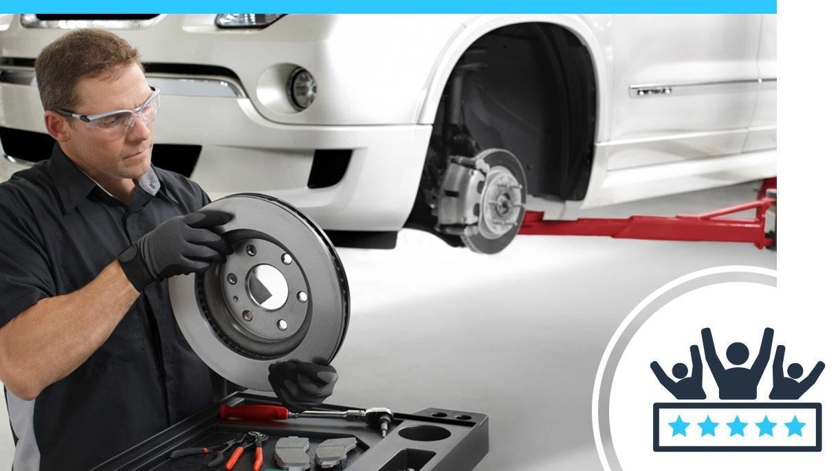 Service technician holding brakes