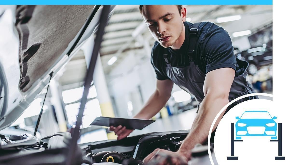 Technician working on engine